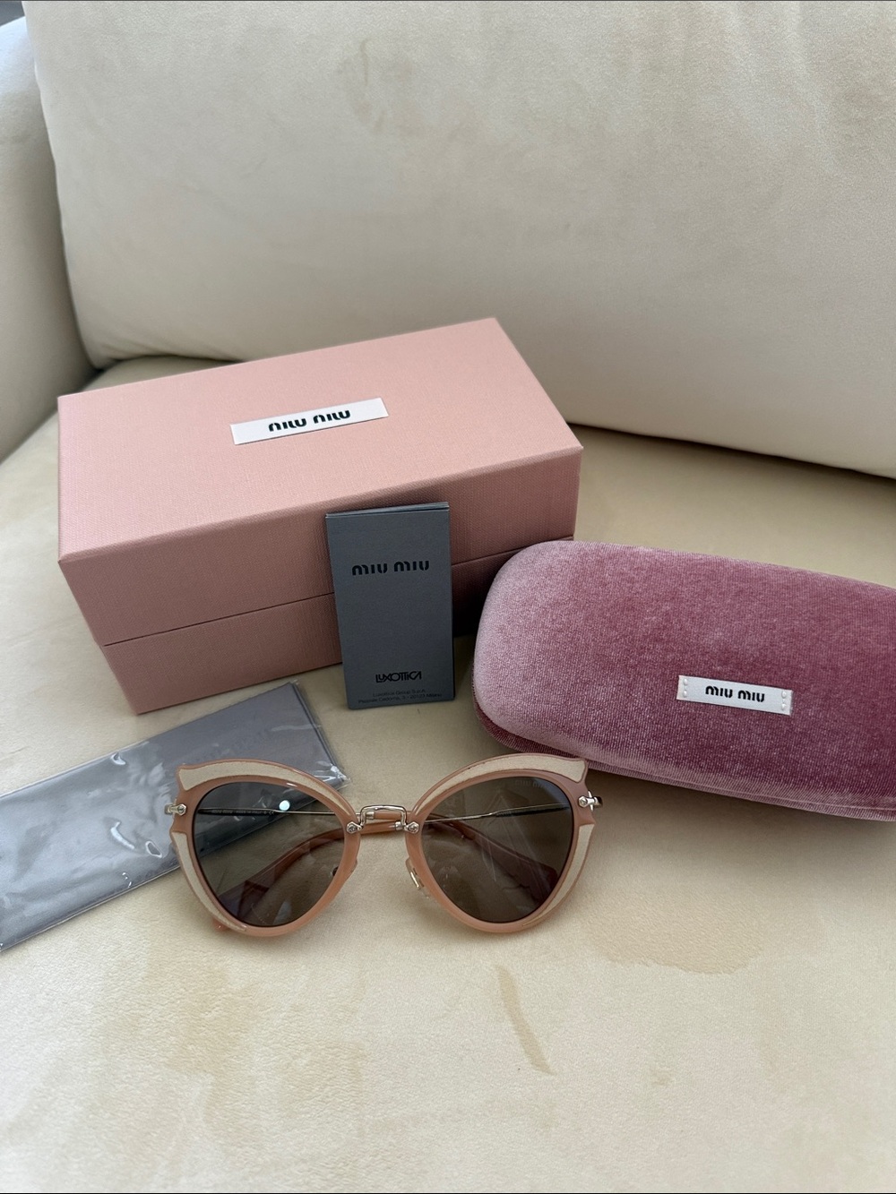 Miu Miu Pink Cat Eye Sunglasses